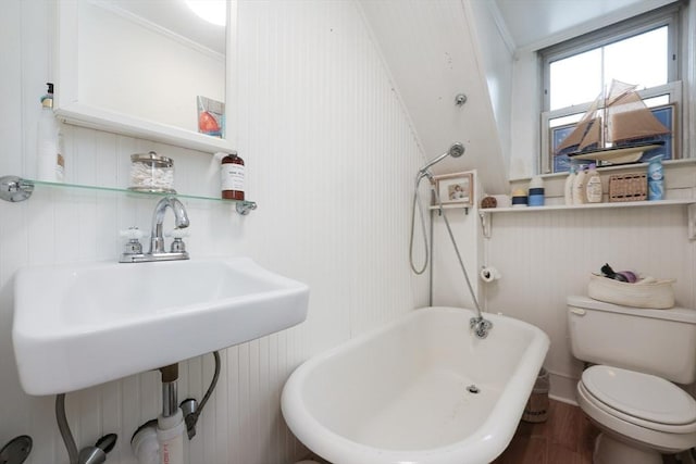 43 Thompson St, Maynard, MA 01754 - full bathroom featuring a freestanding tub, wood finished floors, and ornamental molding
