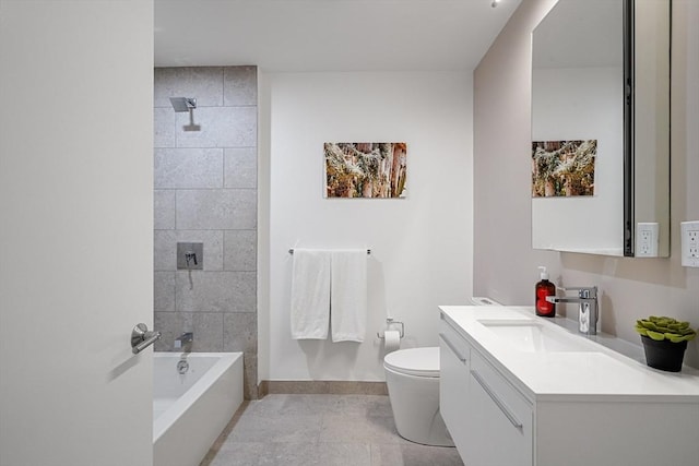 bathroom featuring toilet, bathtub / shower combination, baseboards, and vanity