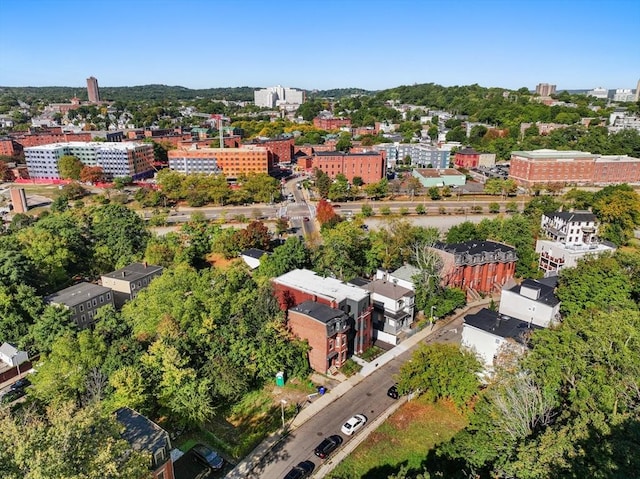 birds eye view of property with a view of city