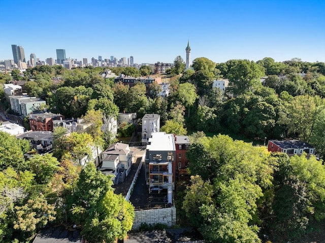 drone / aerial view featuring a city view