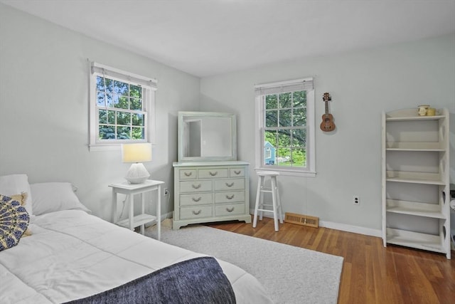 132 Biscayne St, Leominster, MA 01453 - bedroom featuring wood finished floors and baseboards