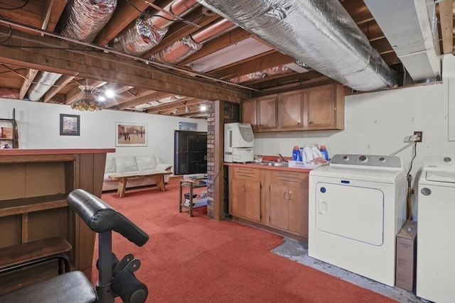 132 Biscayne St, Leominster, MA 01453 - unfinished below grade area featuring washing machine and clothes dryer and light carpet