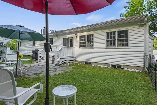 132 Biscayne St, Leominster, MA 01453 - rear view of house with a patio area and a deck