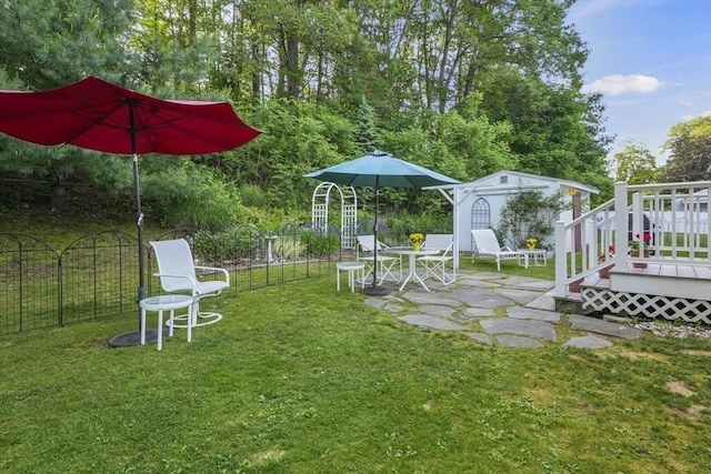 132 Biscayne St, Leominster, MA 01453 - view of yard featuring a shed, a patio area, and a deck