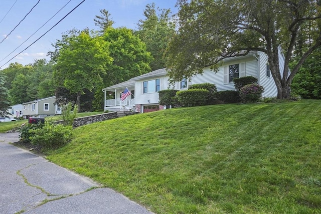 132 Biscayne St, Leominster, MA 01453 - view of front of home featuring a front yard and covered porch