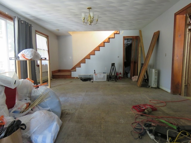 basement with a chandelier