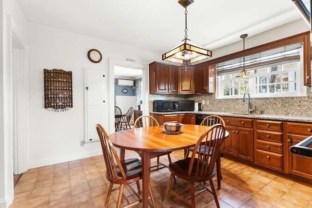 dining space with light tile patterned flooring