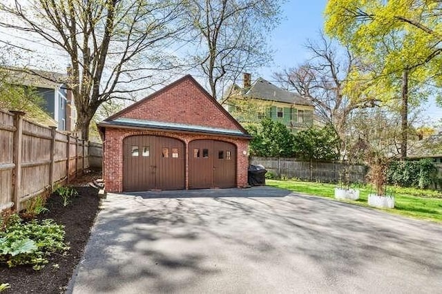 detached garage with fence