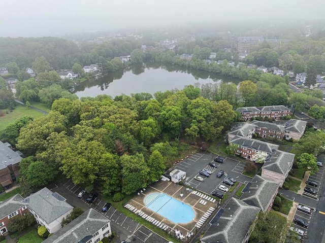 aerial view of a nearby body of water and a pool
