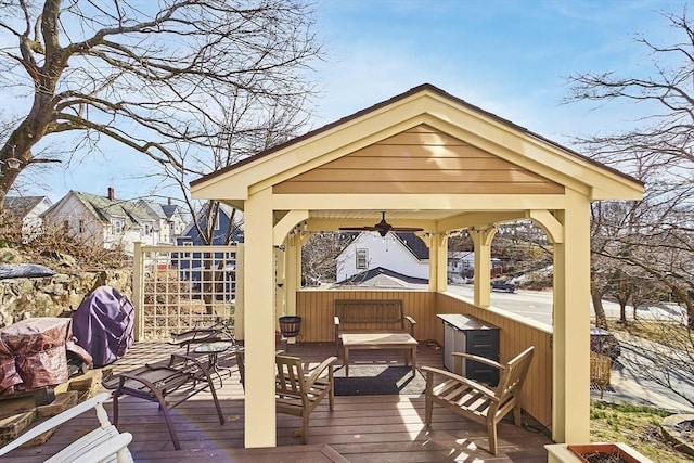 wooden terrace with a gazebo