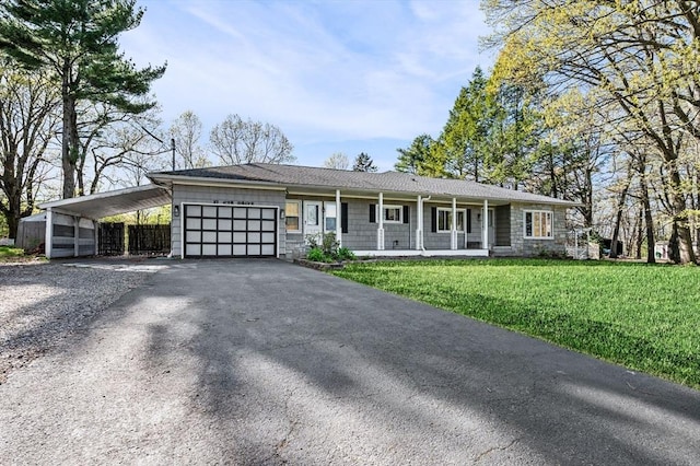view of front facade with a garage, a front lawn, aphalt driveway, covered porch, and stone siding
