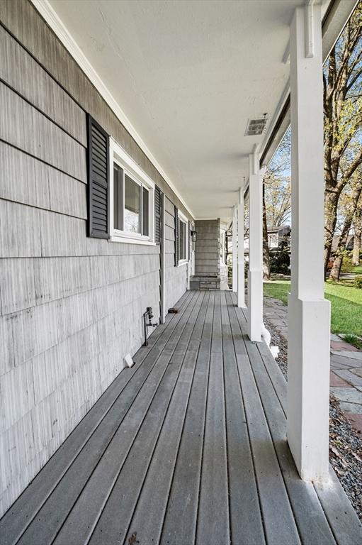 wooden deck featuring covered porch