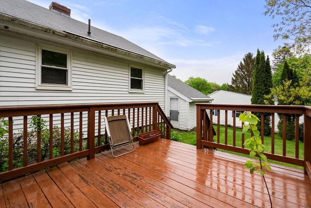 deck featuring a yard