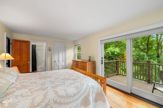 994 Centre St, Boston, MA 02130 - bedroom featuring access to exterior and wood finished floors