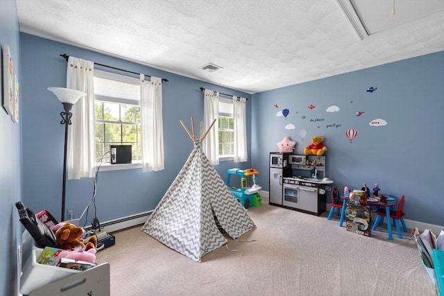 40 King Philip Dr, Rehoboth, MA 02769 - rec room featuring a baseboard radiator, carpet floors, a textured ceiling, and baseboards
