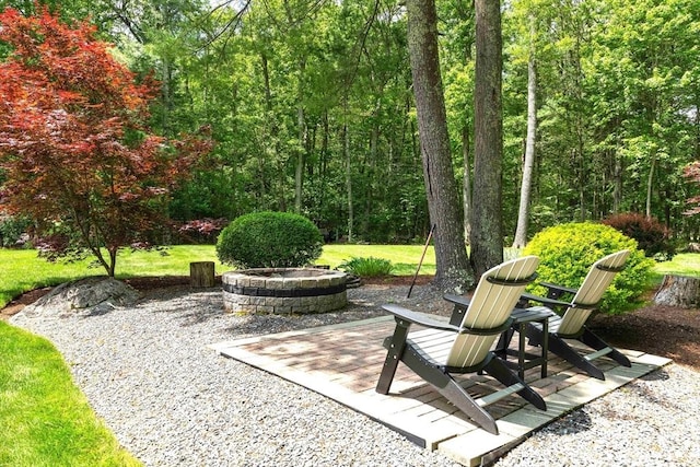 40 King Philip Dr, Rehoboth, MA 02769 - view of patio / terrace with an outdoor fire pit