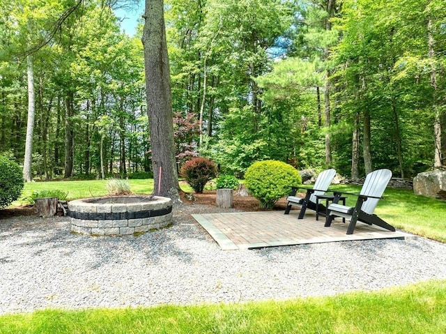 40 King Philip Dr, Rehoboth, MA 02769 - view of patio with a fire pit