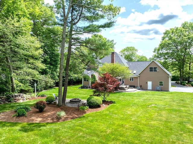 40 King Philip Dr, Rehoboth, MA 02769 - view of green lawn with a fire pit