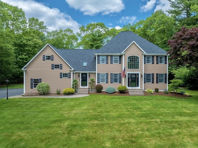 40 King Philip Dr, Rehoboth, MA 02769 - colonial house with entry steps, roof with shingles, and a front yard