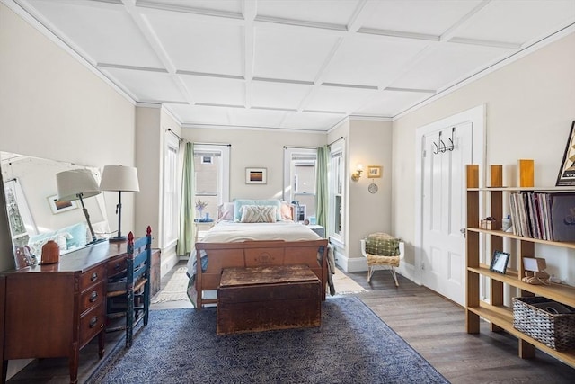 bedroom with dark wood-type flooring and coffered ceiling