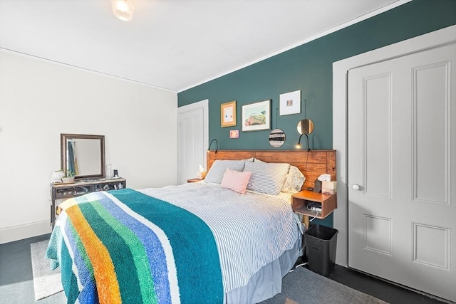 bedroom with crown molding