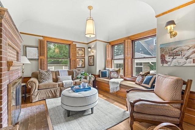 5 Stratford Rd, Winchester, MA 01890 - living room featuring a fireplace, wood finished floors, and ornamental molding