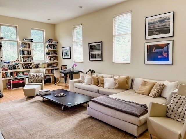 living room with hardwood / wood-style flooring and plenty of natural light