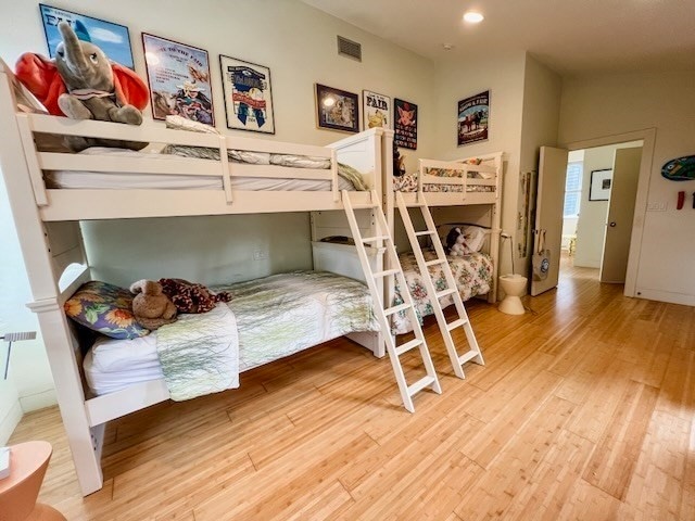 bedroom featuring hardwood / wood-style floors