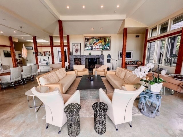 living room featuring vaulted ceiling