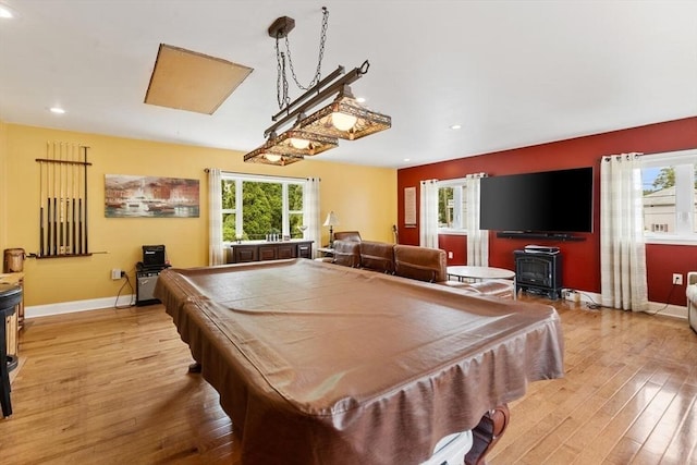 12 Clarner Rd, Lynn, MA 01904 - recreation room featuring hardwood / wood-style flooring, healthy amount of natural light, a wood stove, recessed lighting, and billiards table