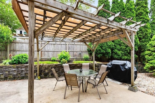 12 Clarner Rd, Lynn, MA 01904 - fenced backyard with outdoor dining space, a pergola, a grill, and a patio