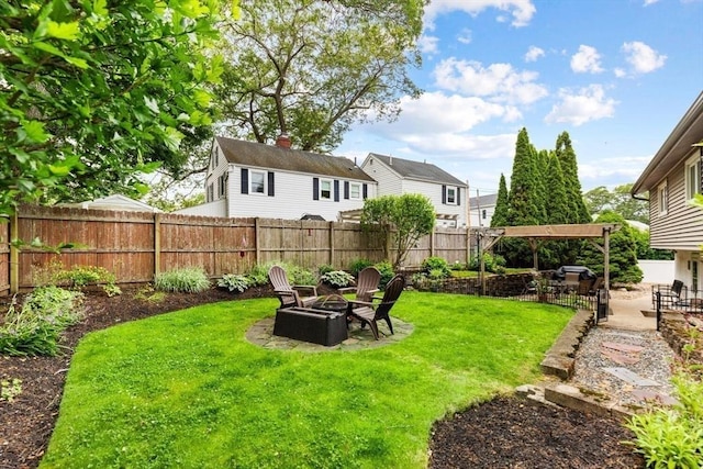 12 Clarner Rd, Lynn, MA 01904 - fenced backyard featuring a fire pit, a patio, and a pergola