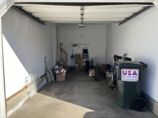 garage featuring a garage door opener