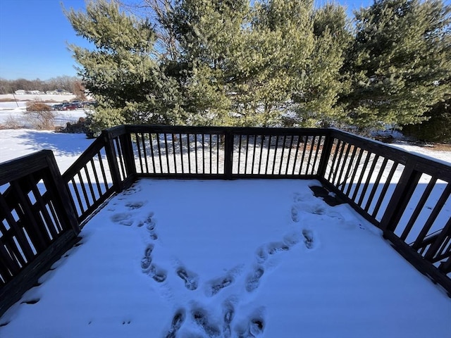 view of snow covered deck