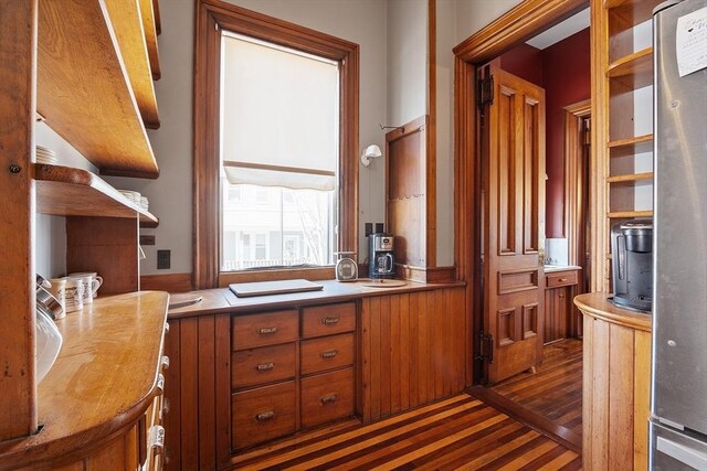 4 W Broadway, Gardner, MA 01440 - interior space featuring brown cabinets, light countertops, freestanding refrigerator, and dark wood-style floors