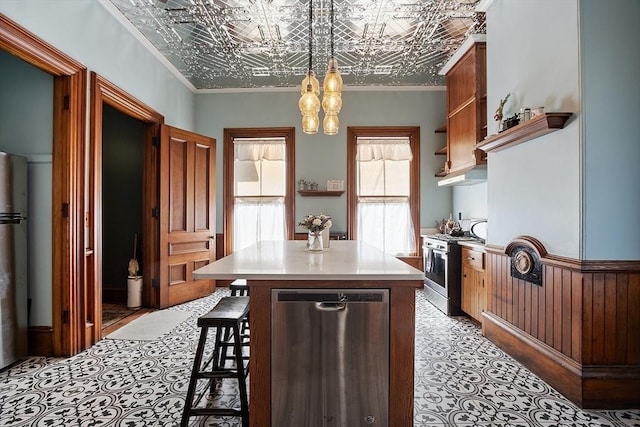 4 W Broadway, Gardner, MA 01440 - kitchen featuring appliances with stainless steel finishes, a notable chandelier, open shelves, and an ornate ceiling