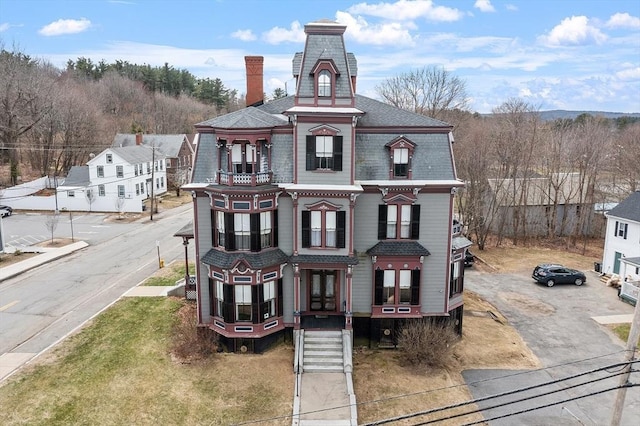 4 W Broadway, Gardner, MA 01440 - view of front of house with roof with shingles and a chimney
