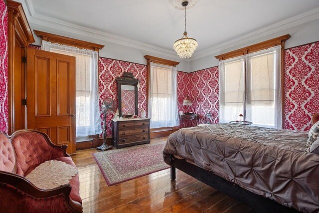 4 W Broadway, Gardner, MA 01440 - bedroom with an inviting chandelier, crown molding, and wood finished floors