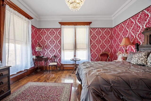 4 W Broadway, Gardner, MA 01440 - bedroom featuring a chandelier, baseboards, ornamental molding, and wood finished floors