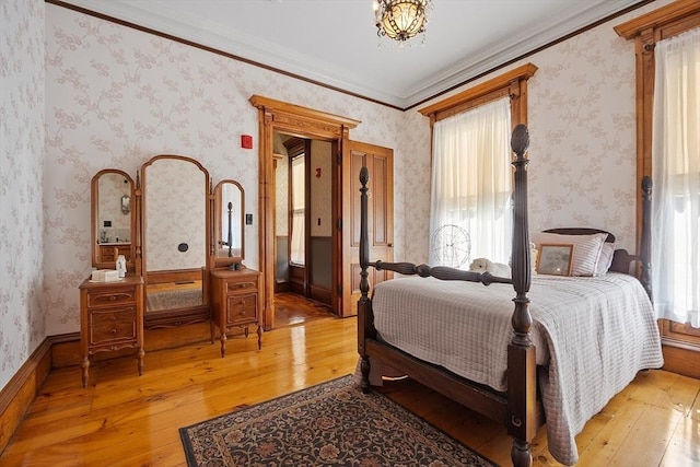4 W Broadway, Gardner, MA 01440 - bedroom featuring ornamental molding, multiple windows, a chandelier, and light wood-style floors