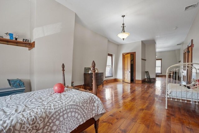 4 W Broadway, Gardner, MA 01440 - bedroom featuring visible vents, baseboards, and hardwood / wood-style floors