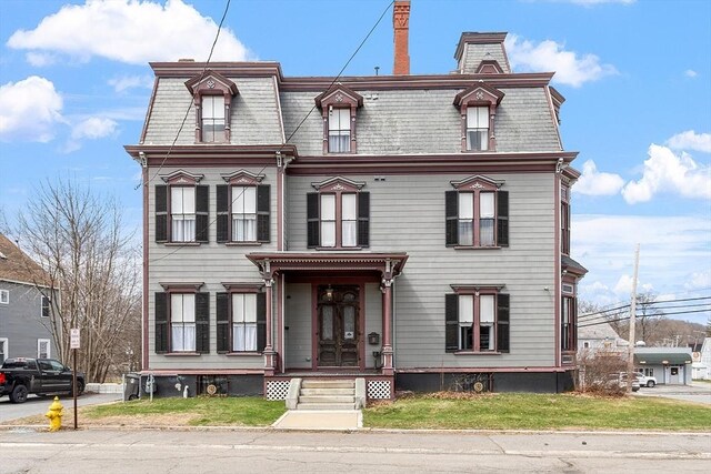 4 W Broadway, Gardner, MA 01440 - victorian home featuring mansard roof and a chimney