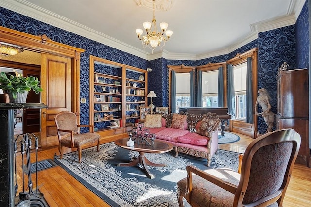 4 W Broadway, Gardner, MA 01440 - living area with hardwood / wood-style floors, wallpapered walls, an inviting chandelier, and crown molding