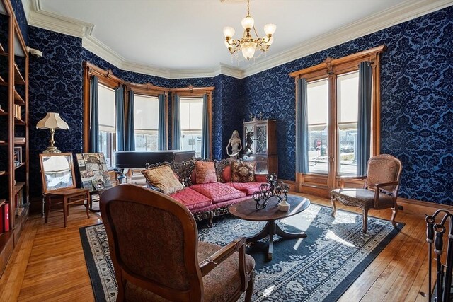 4 W Broadway, Gardner, MA 01440 - living area with a chandelier, hardwood / wood-style floors, wallpapered walls, and crown molding