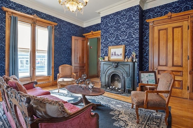 4 W Broadway, Gardner, MA 01440 - sitting room featuring plenty of natural light, a notable chandelier, wallpapered walls, and wood finished floors