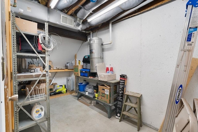 36 Tobey Rd Unit 25, Dracut, MA 01826 - unfinished basement featuring a workshop area and a central vacuum unit