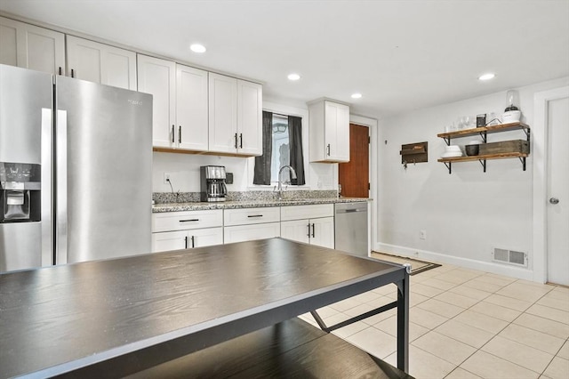 114 Linebrook Rd, Ipswich, MA 01938 - kitchen with appliances with stainless steel finishes, white cabinetry, open shelves, a sink, and recessed lighting