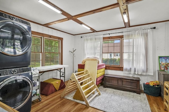 114 Linebrook Rd, Ipswich, MA 01938 - washroom with stacked washer / drying machine, wood finished floors, and plenty of natural light