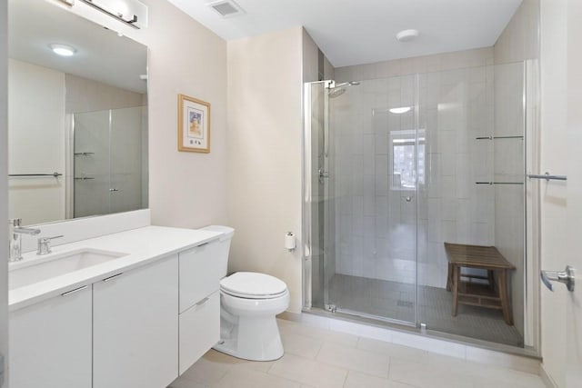 121 Portland St Unit 902, Boston, MA 02114 - bathroom with vanity, tile patterned floors, and a shower stall