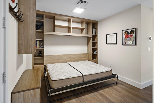 121 Portland St Unit 902, Boston, MA 02114 - bedroom with baseboards and wood finished floors